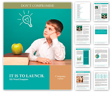 Cheerful little boy sitting at the table. School concept Word Template